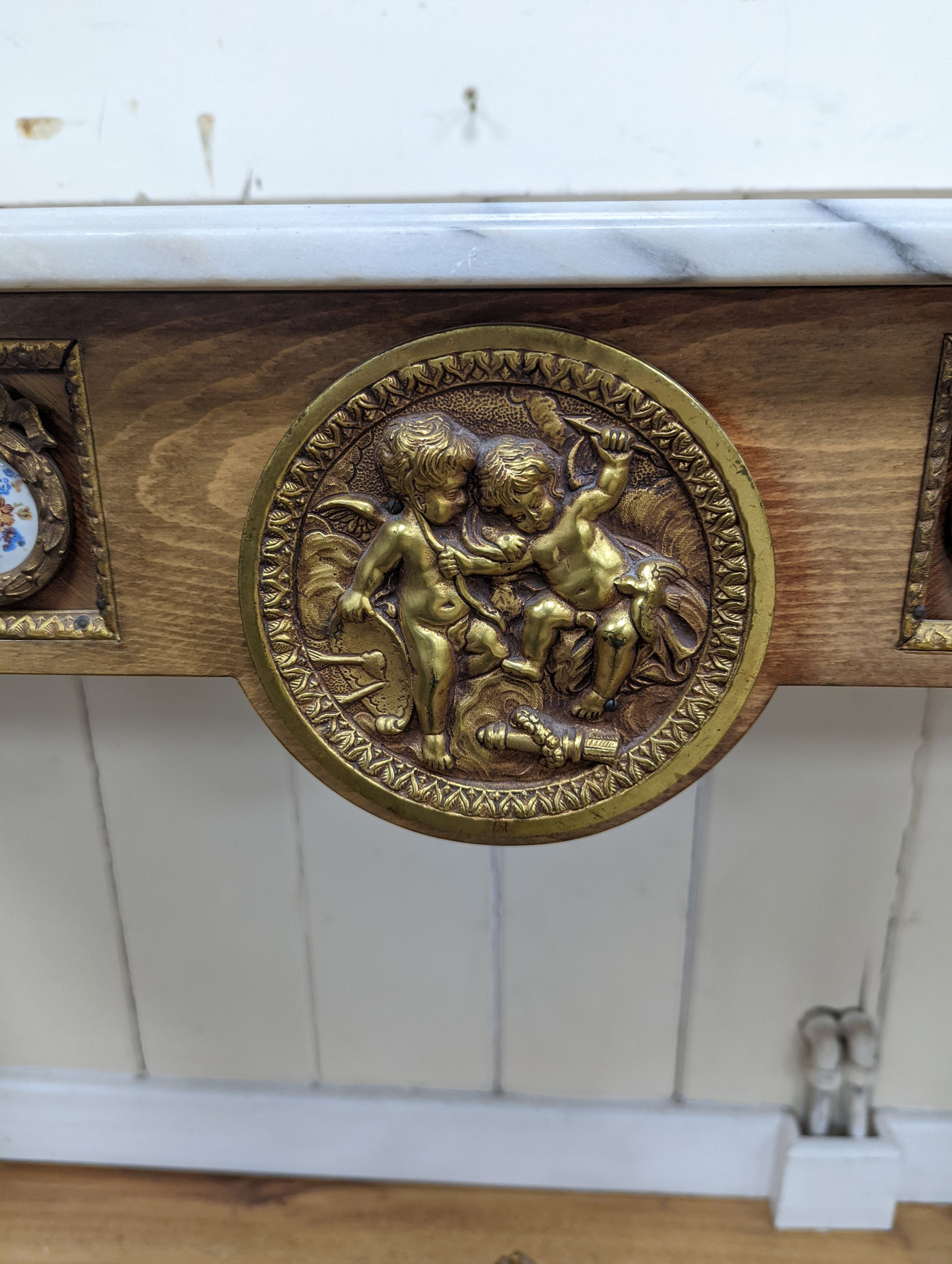 A Louis XVI style gilt metal and marble top console table, width 133cm, height 81cm